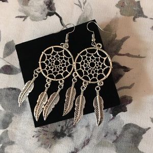 Silver tone dream catcher earrings
